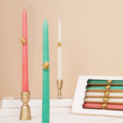 Velas de mesa con estrellas doradas