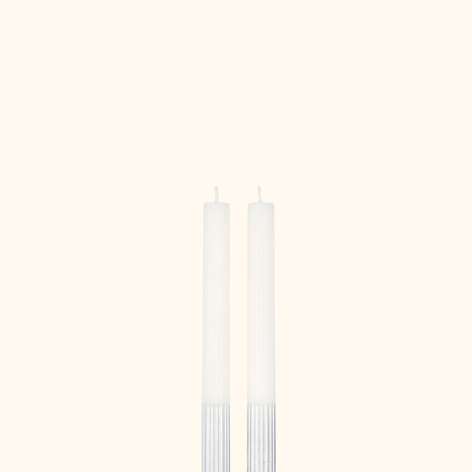 Velas de mesa bañadas en plateado