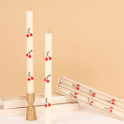 Velas de mesa con cerezas