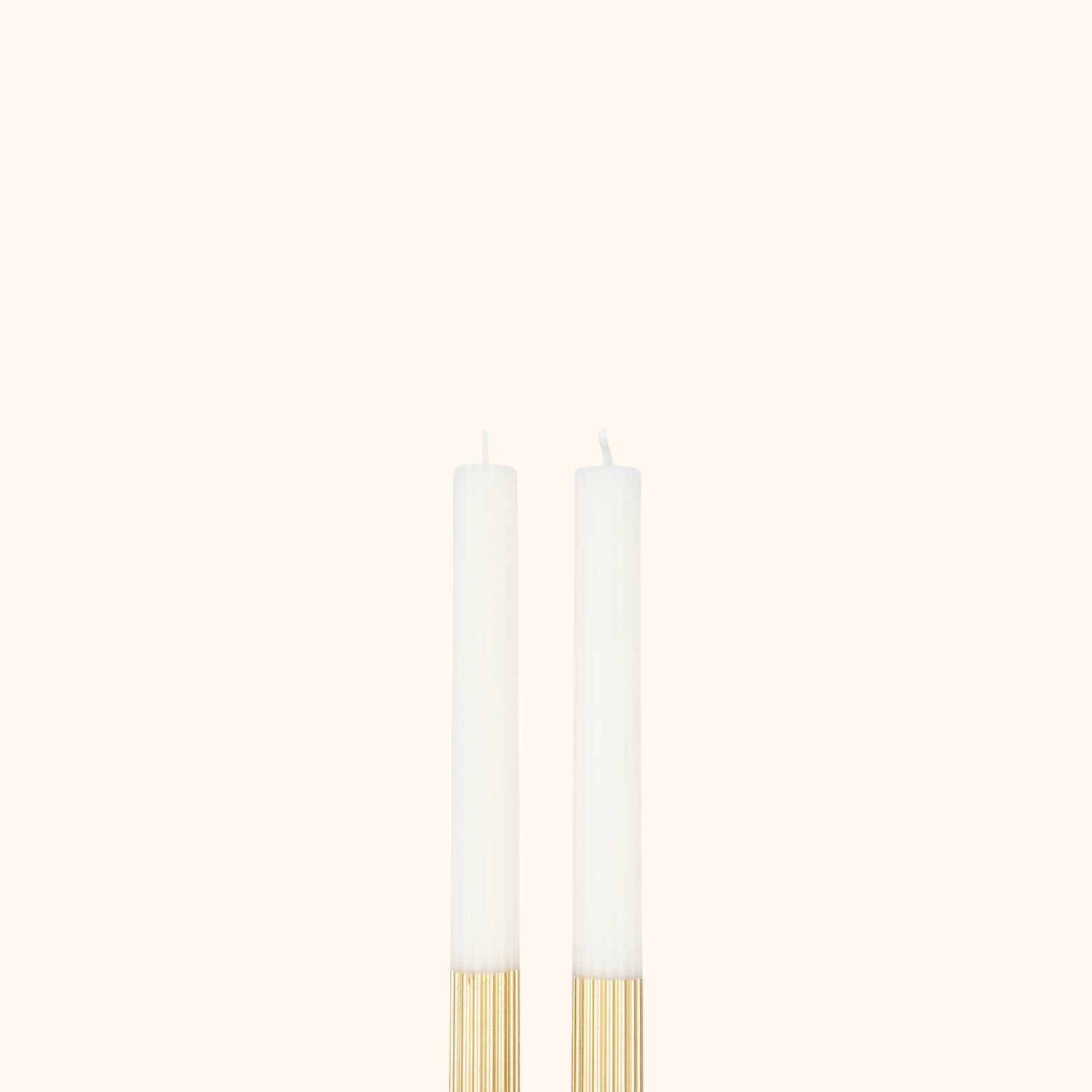 Velas de mesa bañadas en dorado