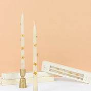 Velas de mesa con estrellas doradas