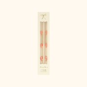 Velas de mesa con lazos rosados