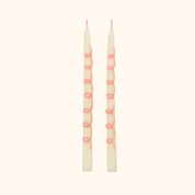 Velas con espirales rosadas
