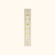 Velas de mesa con estrellas doradas