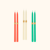 Velas de mesa con estrellas doradas